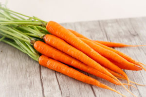 Carrots contain beta carotene which converts to vitamin A